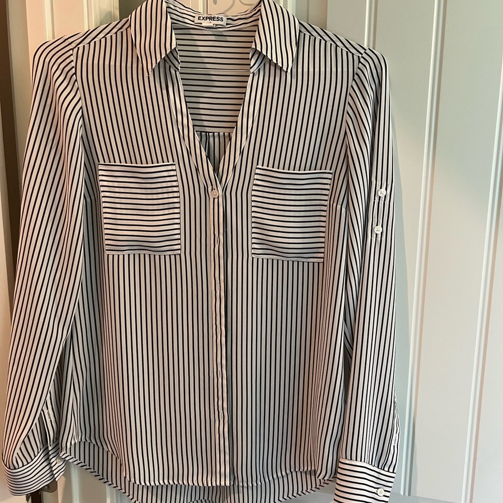 Women’s casual shirt. Goes great with slacks.